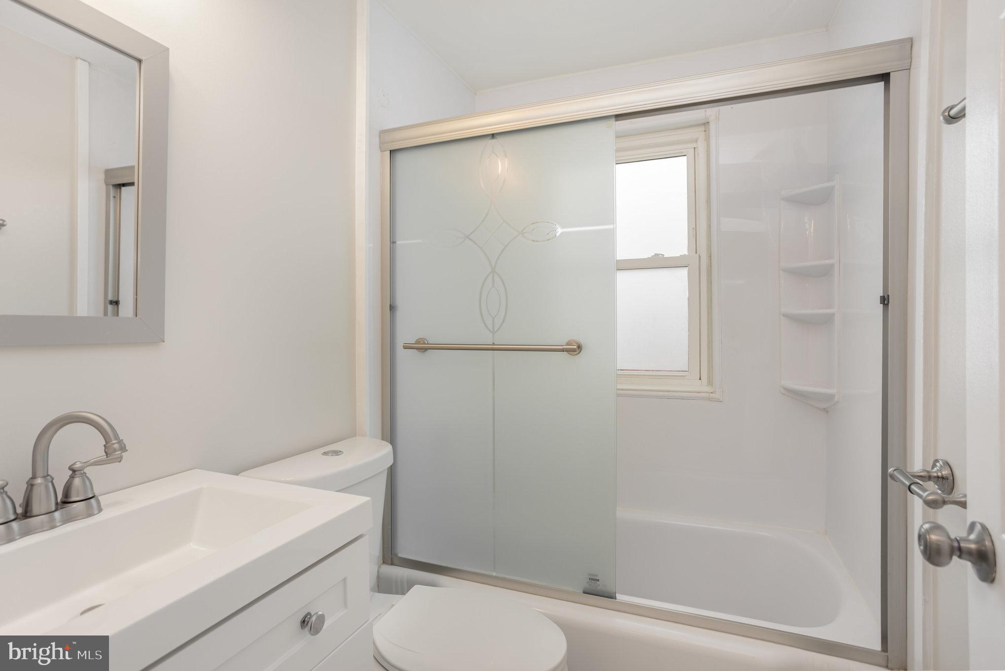 53 South Hawthorne Road Middle River, MD 21220 - Photo 18 of 29 a bathroom with a sink toilet and shower