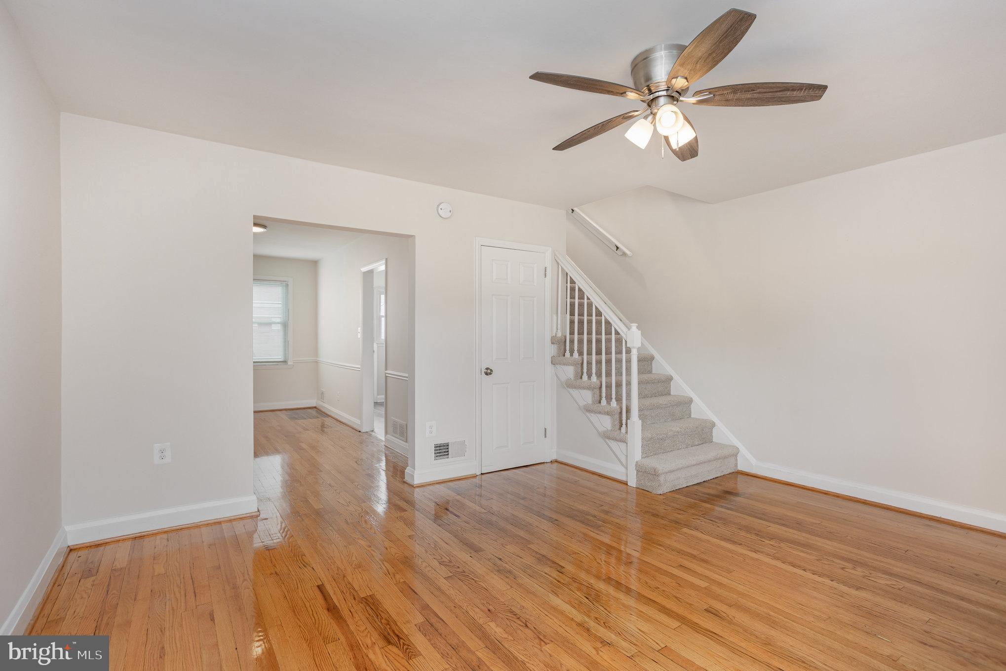 53 South Hawthorne Road Middle River, MD 21220 - Photo 5 of 29 wooden floor in an empty room with a window