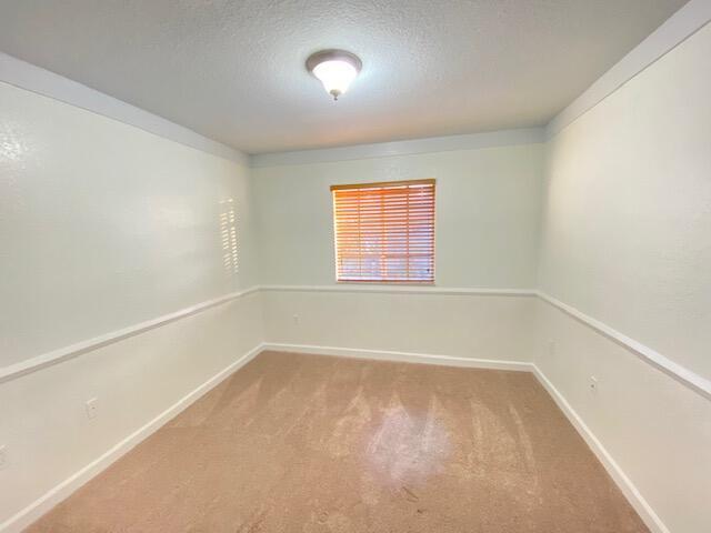 4105 Napoli Lake Drive Riviera Beach, FL 33410 - Photo 5 of 14 an empty room with a window
