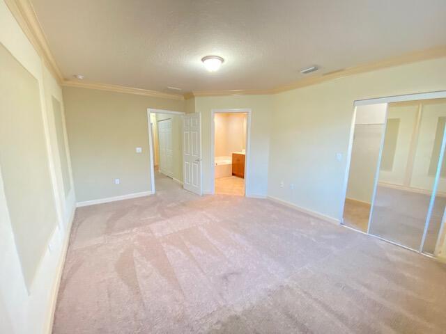 4105 Napoli Lake Drive Riviera Beach, FL 33410 - Photo 7 of 14 a view of a big room with closet and windows