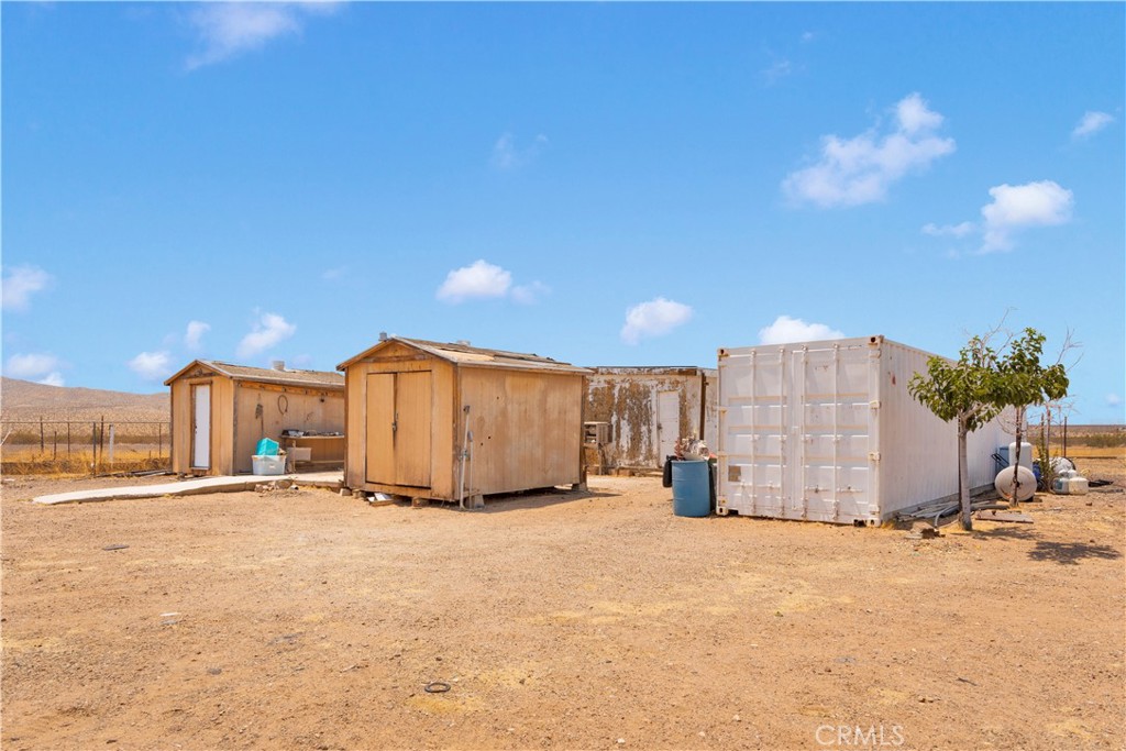 27320 Rodeo Road Helendale, CA 92342 - Photo 48 of 54 3 sheds included (60 foot steel container is not included but can be negotiated)