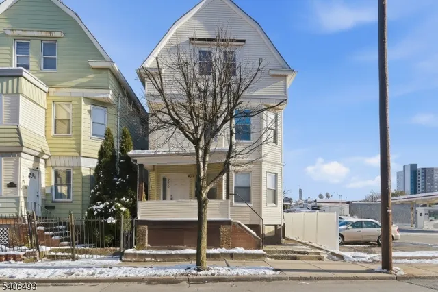 a front view of a building with street view
