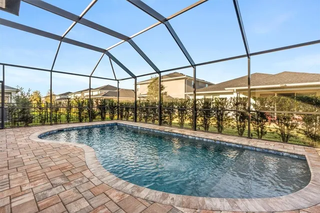 a view of outdoor space with swimming pool