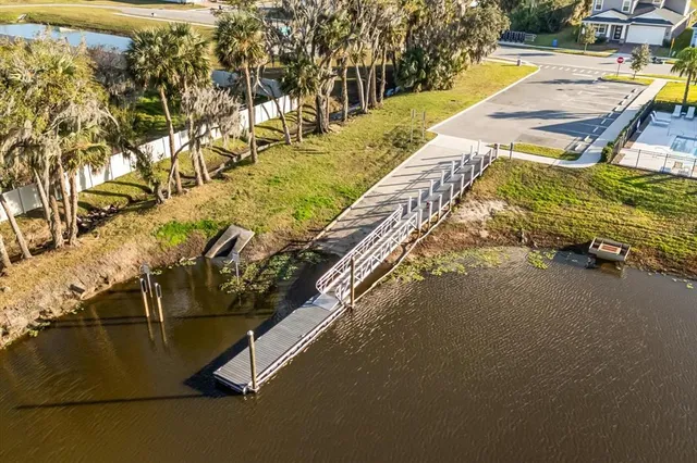 a view of swimming pool with a yard