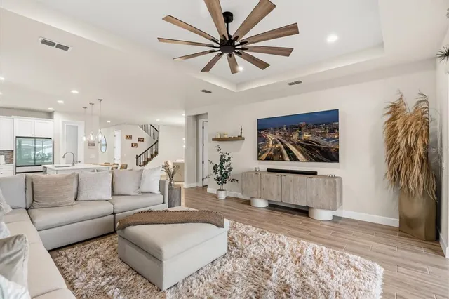 a living room with furniture and a rug