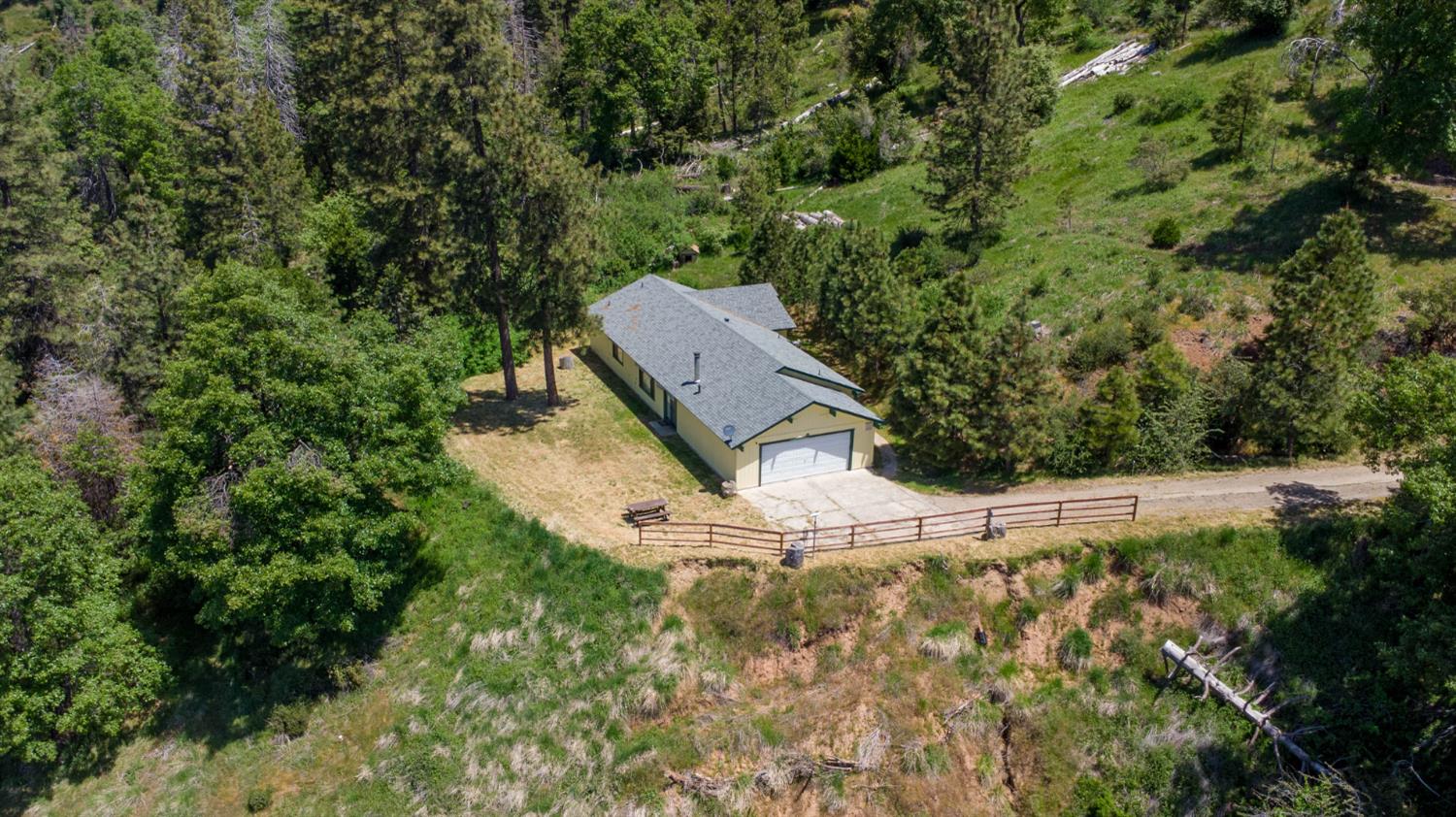 52865 Highway 245 Miramonte, CA 93641 - Photo 1 of 29 an aerial view of a house with a yard