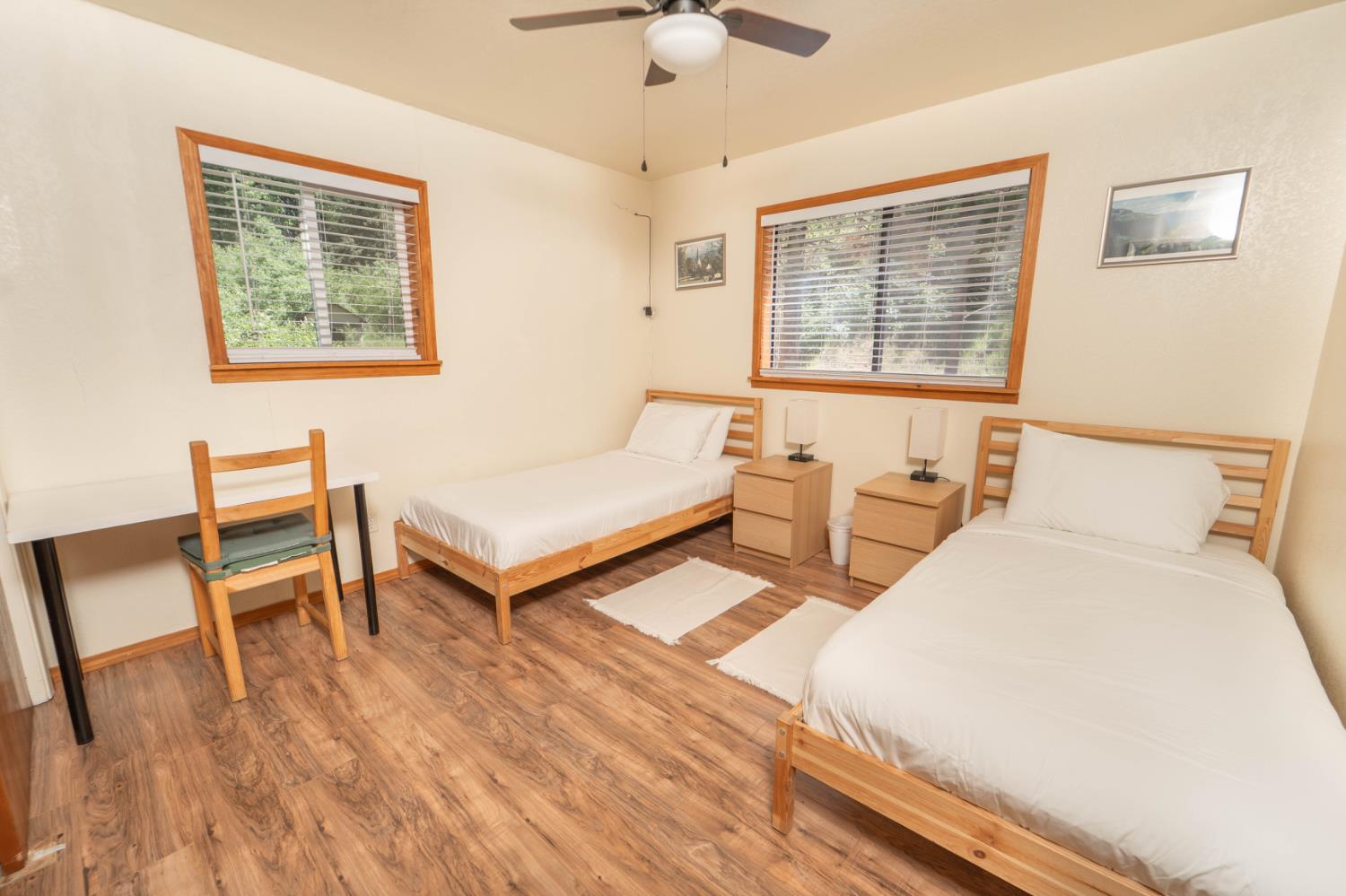 52865 Highway 245 Miramonte, CA 93641 - Photo 14 of 29 a bedroom with two beds and a desk