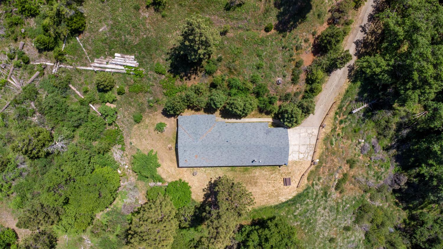 52865 Highway 245 Miramonte, CA 93641 - Photo 26 of 29 an aerial view of residential house with outdoor space and trees all around