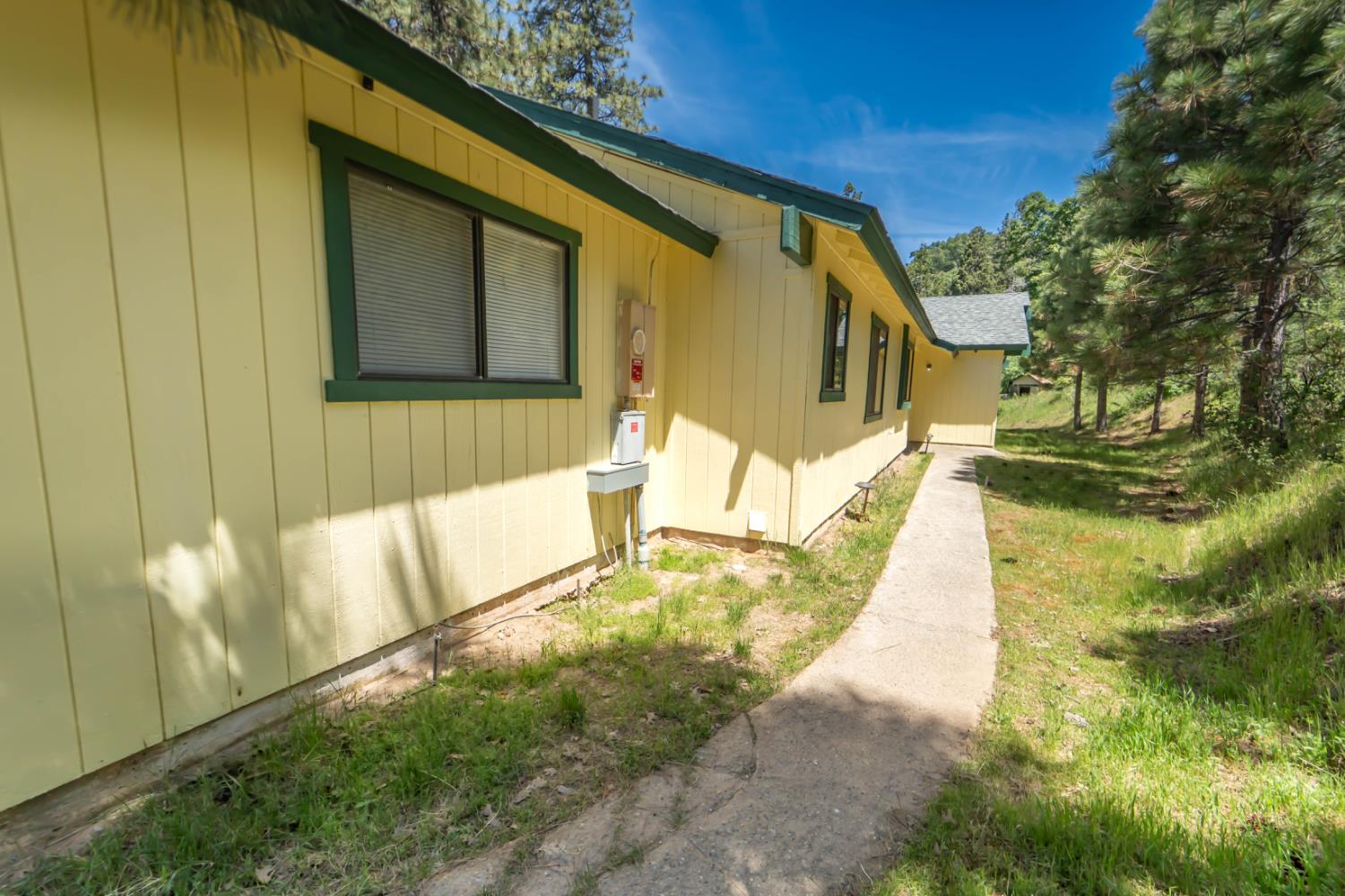 52865 Highway 245 Miramonte, CA 93641 - Photo 5 of 29 a view of house with backyard