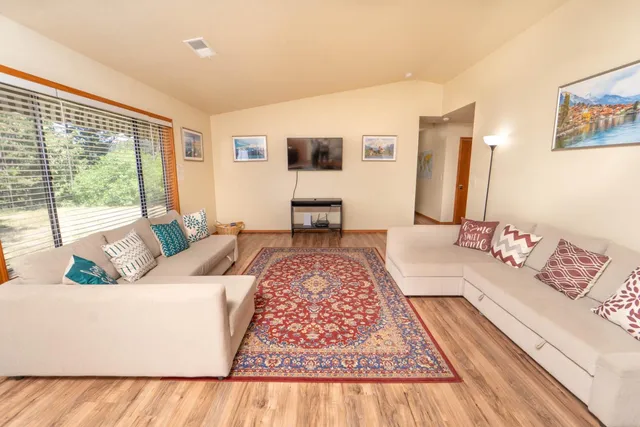 a living room with a couch and a table