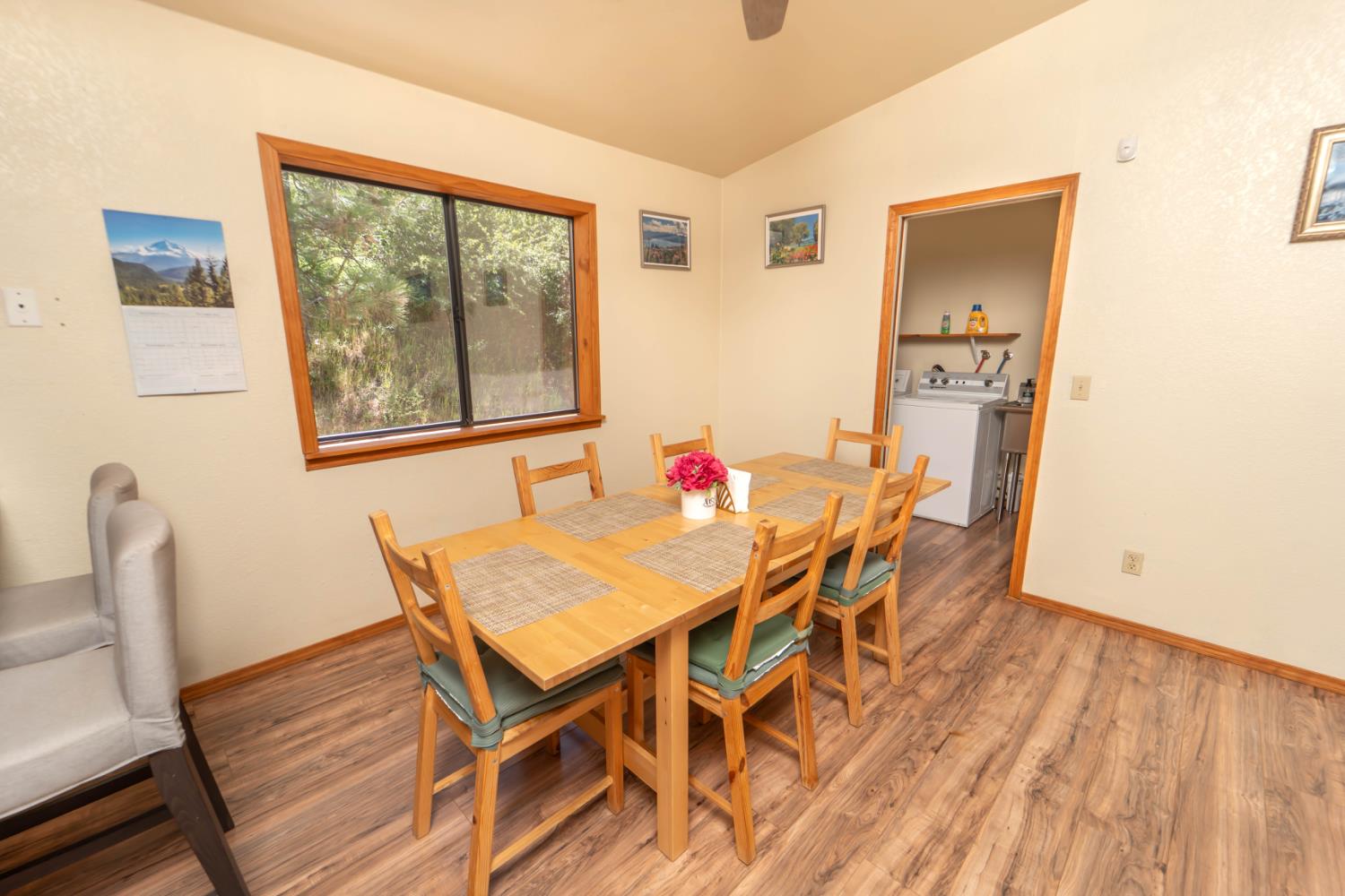 52865 Highway 245 Miramonte, CA 93641 - Photo 10 of 29 a view of a dining room with furniture and wooden floor