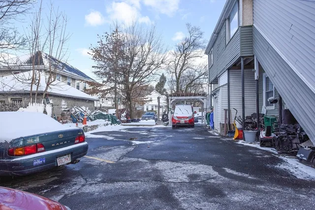 a view of street with parked cars