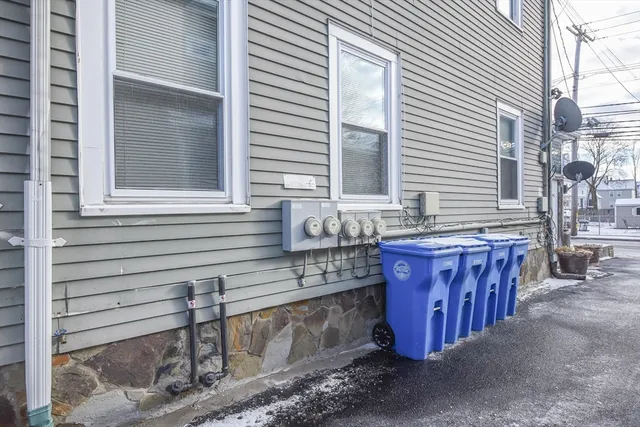 a view of a house with a backyard and a sink