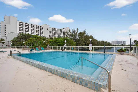 a view of a swimming pool with a terrace