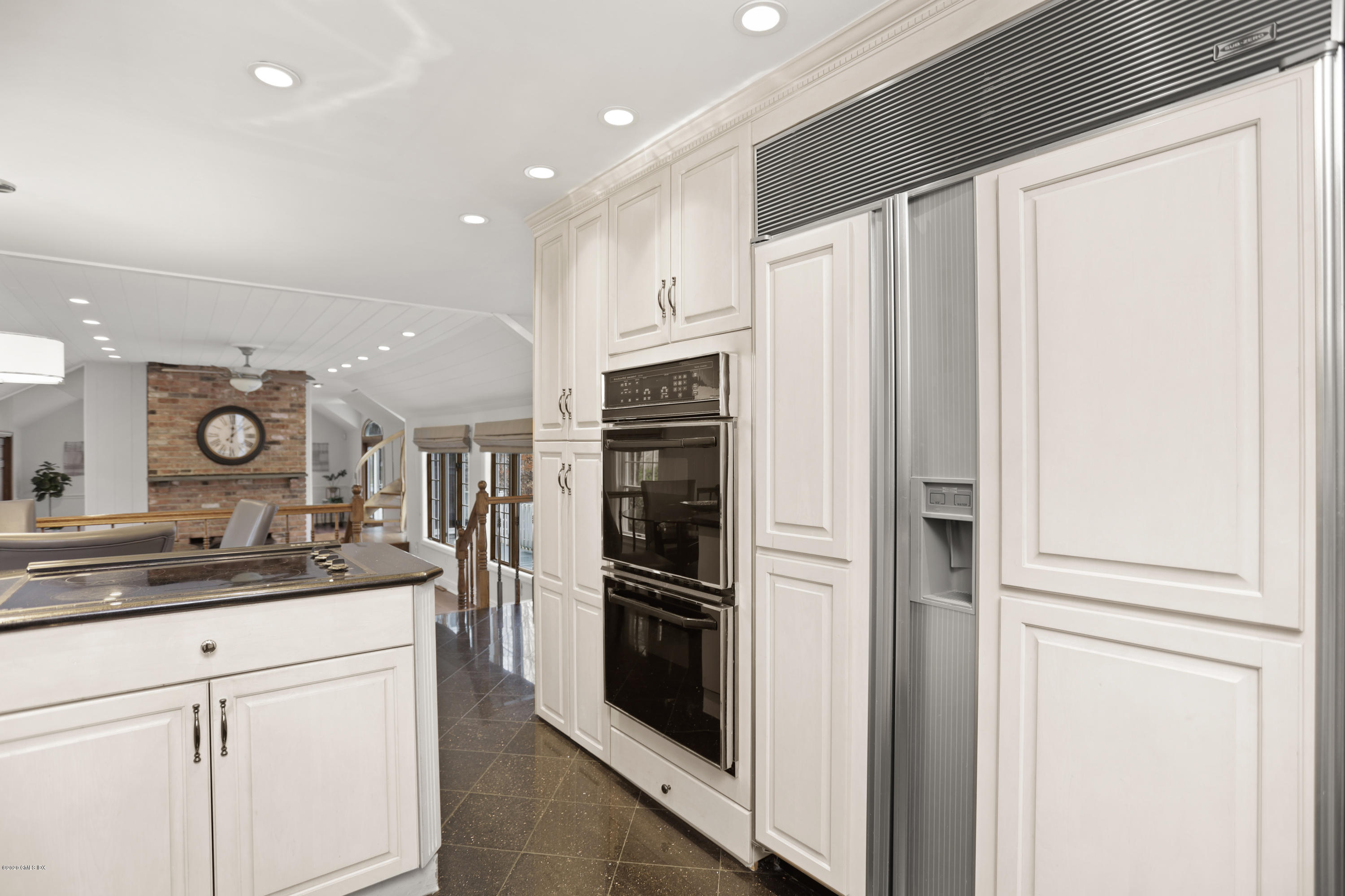 92 North Old Stone Bridge Road Cos Cob, CT 06807 - Photo 15 of 38 a kitchen with stainless steel appliances a refrigerator and a sink