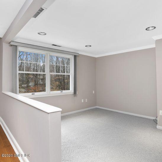 92 North Old Stone Bridge Road Cos Cob, CT 06807 - Photo 18 of 38 an empty room with windows
