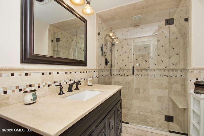 92 North Old Stone Bridge Road Cos Cob, CT 06807 - Photo 21 of 38 a bathroom with a sink mirror and vanity