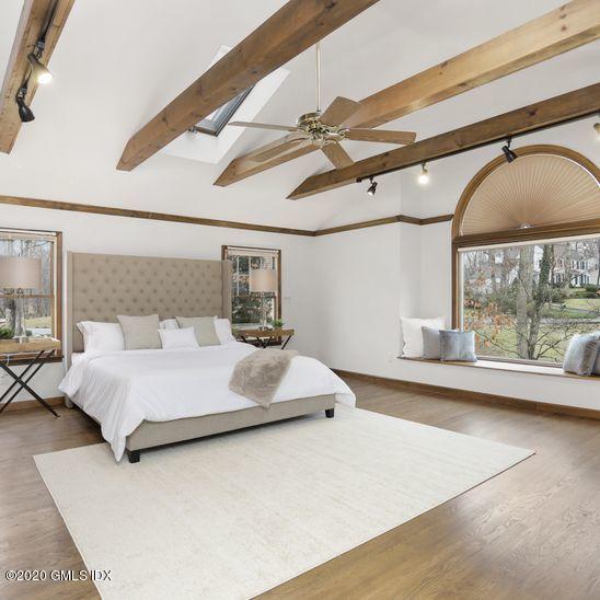 92 North Old Stone Bridge Road Cos Cob, CT 06807 - Photo 25 of 38 a bedroom with a large bed and a large window