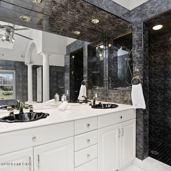 92 North Old Stone Bridge Road Cos Cob, CT 06807 - Photo 29 of 38 a bathroom with a sink and a mirror