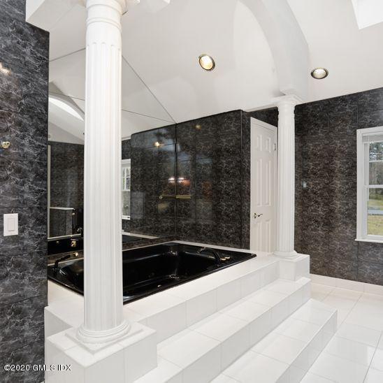 92 North Old Stone Bridge Road Cos Cob, CT 06807 - Photo 30 of 38 a bathroom with a shower and mirror