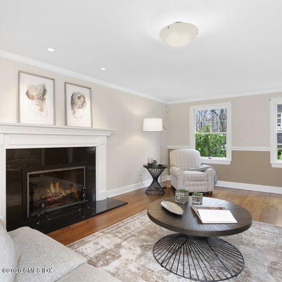 92 North Old Stone Bridge Road Cos Cob, CT 06807 - Photo 4 of 38 a living room with furniture and a fireplace