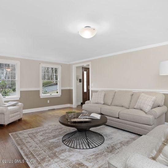 92 North Old Stone Bridge Road Cos Cob, CT 06807 - Photo 5 of 38 a living room with furniture and a table