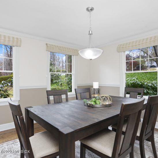 92 North Old Stone Bridge Road Cos Cob, CT 06807 - Photo 6 of 38 a view of a dining room with furniture window and outside view