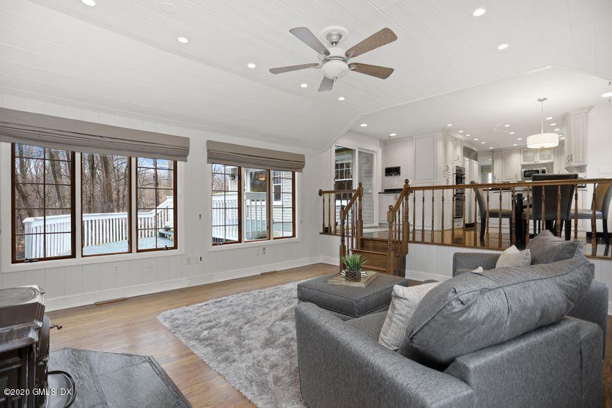 92 North Old Stone Bridge Road Cos Cob, CT 06807 - Photo 10 of 38 a living room with furniture and a large window