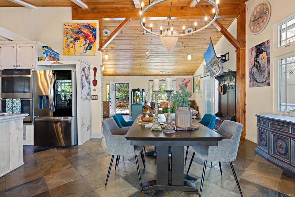 2042 Pheasant Run Road Fallbrook, CA 92028 - Photo 15 of 75 a view of a dining table and chairs in the patio