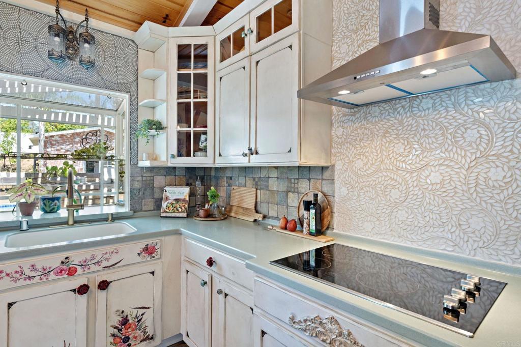 2042 Pheasant Run Road Fallbrook, CA 92028 - Photo 18 of 75 a kitchen with a cabinets and window