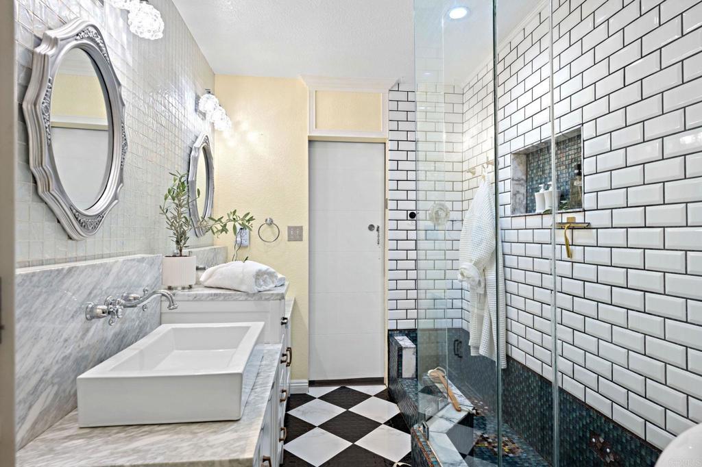 2042 Pheasant Run Road Fallbrook, CA 92028 - Photo 26 of 75 a bathroom with a sink a toilet and a mirror