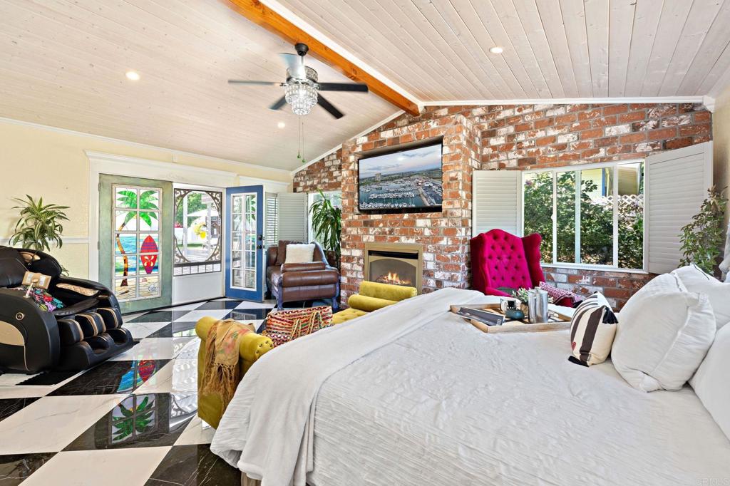 2042 Pheasant Run Road Fallbrook, CA 92028 - Photo 28 of 75 a bed room with a bed and a flat screen tv