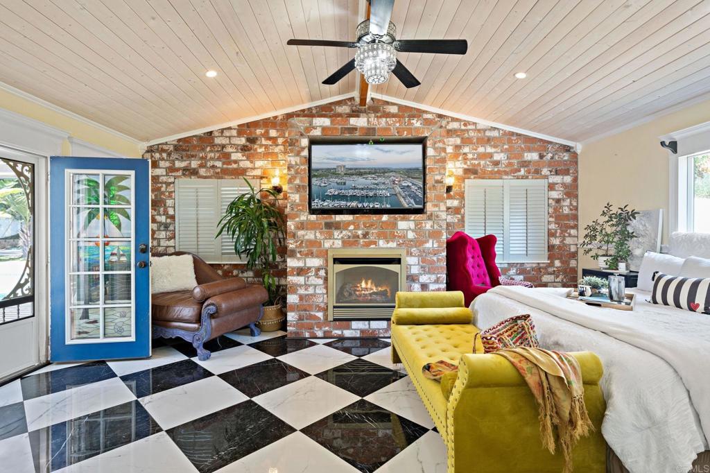 2042 Pheasant Run Road Fallbrook, CA 92028 - Photo 31 of 75 a living room with furniture and a fireplace