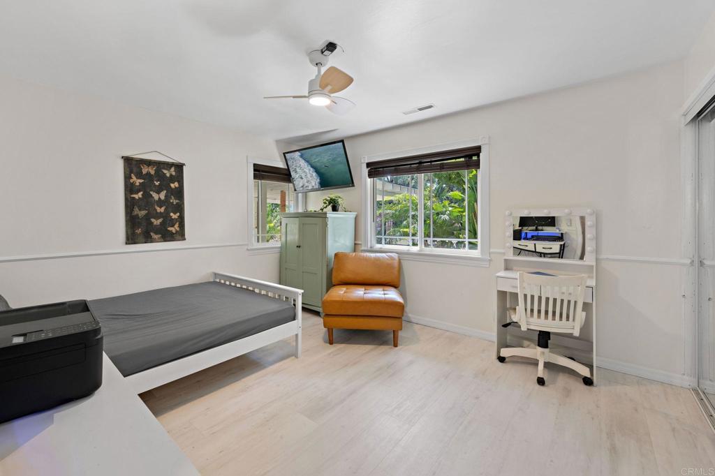 2042 Pheasant Run Road Fallbrook, CA 92028 - Photo 33 of 75 a bedroom with a bed and a chair