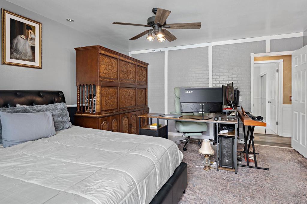 2042 Pheasant Run Road Fallbrook, CA 92028 - Photo 40 of 75 a bedroom with a bed and a desk