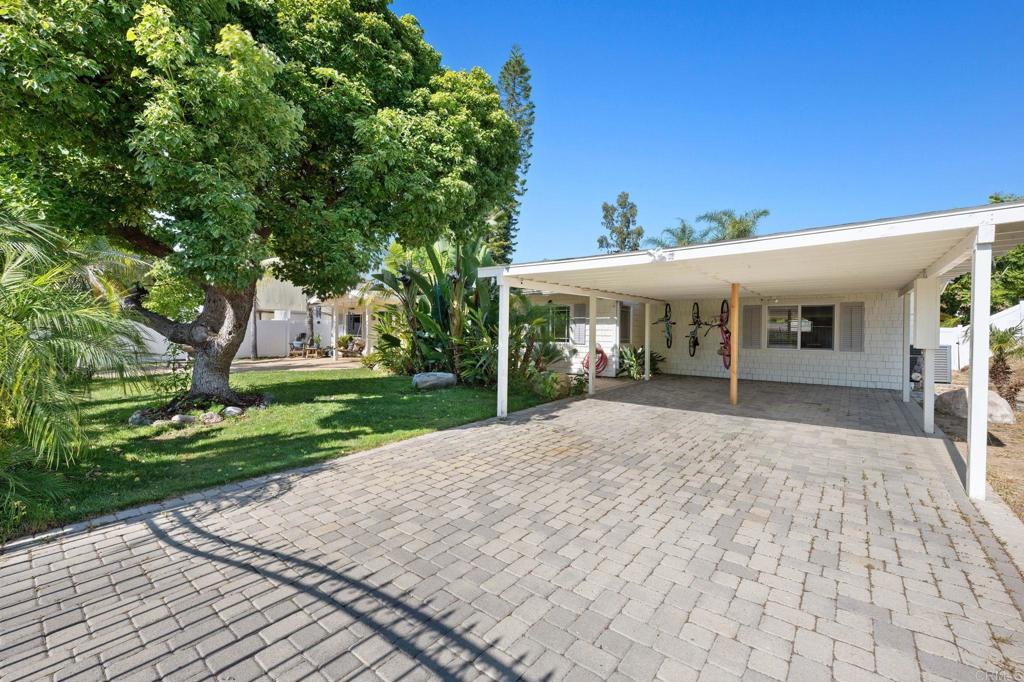 2042 Pheasant Run Road Fallbrook, CA 92028 - Photo 51 of 75 a view of a house with a yard