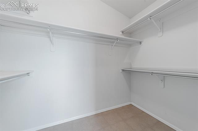 12576 Snaffle Bit Road Peyton, CO 80831 - Photo 13 of 37 Big closet in primary.
