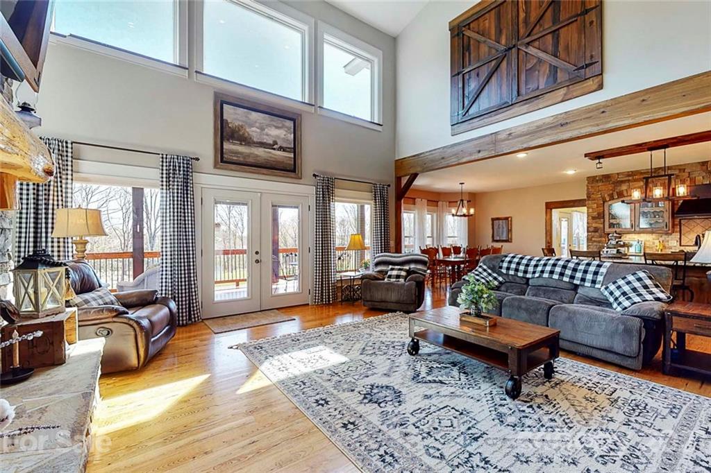 7555 Stokes Ferry Road Salisbury, NC 28146 - Photo 11 of 48 a living room with furniture and a rug
