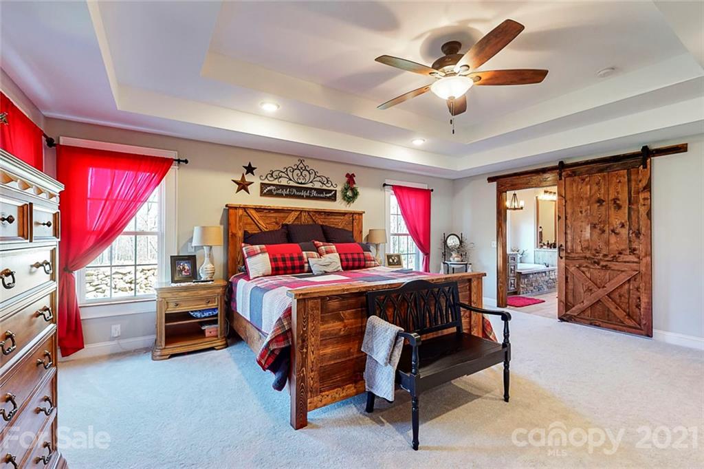 7555 Stokes Ferry Road Salisbury, NC 28146 - Photo 19 of 48 a bed room with a bed and a window