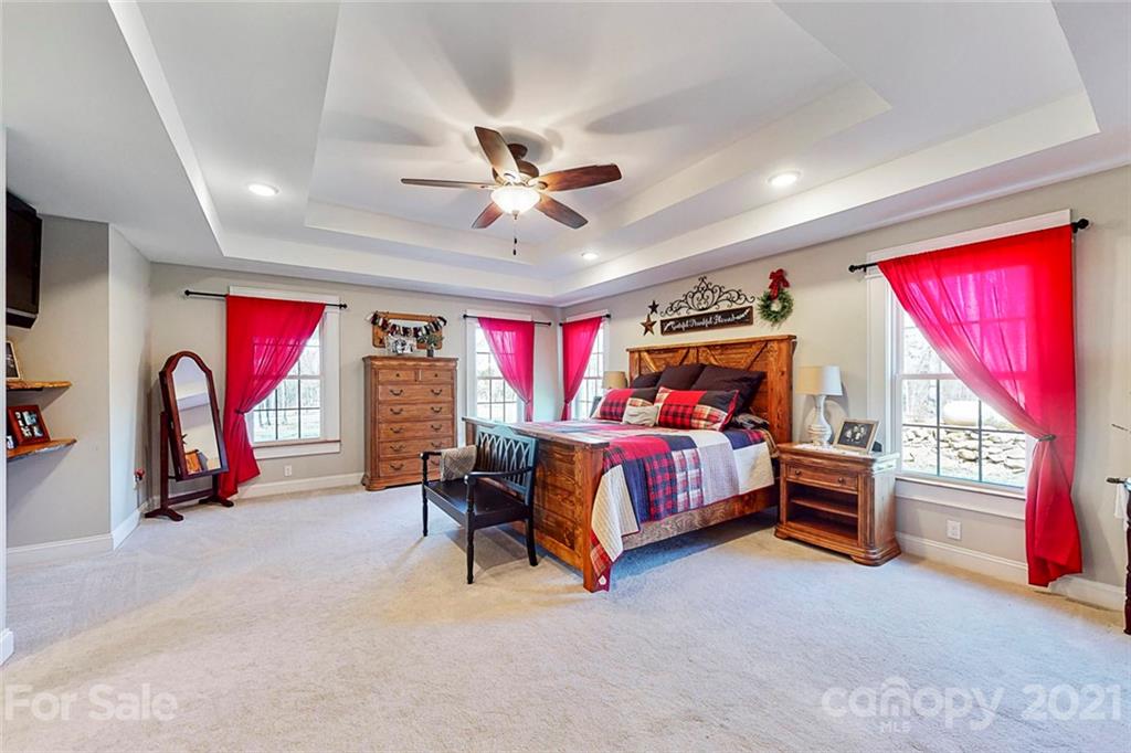 7555 Stokes Ferry Road Salisbury, NC 28146 - Photo 21 of 48 a bedroom with bed and a large window