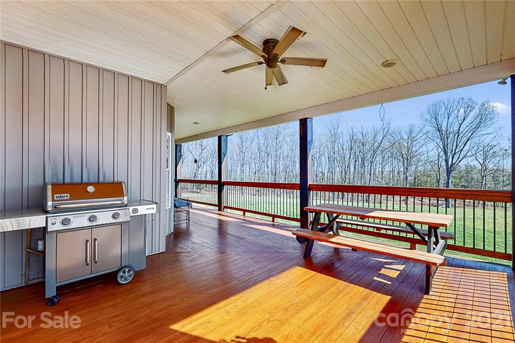 7555 Stokes Ferry Road Salisbury, NC 28146 - Photo 39 of 48 a reading room with furniture and a wooden floor
