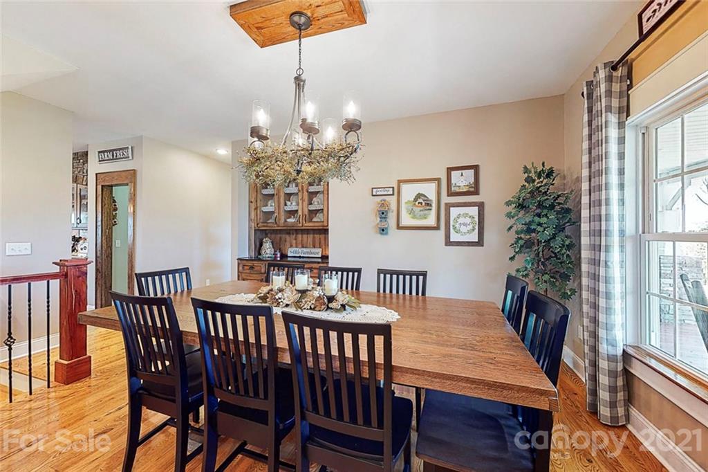 7555 Stokes Ferry Road Salisbury, NC 28146 - Photo 5 of 48 a view of a dining room with furniture window and outside view
