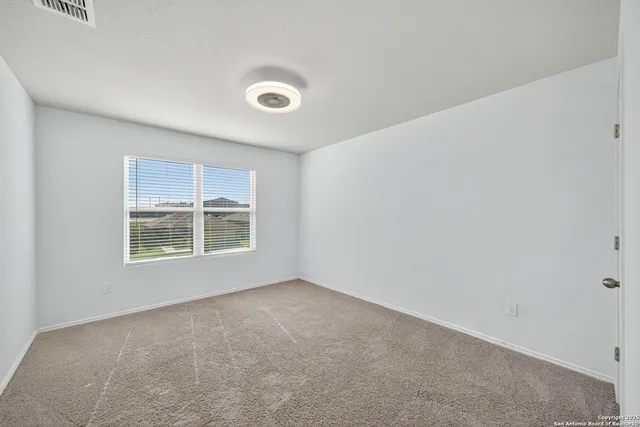 an empty room with a window