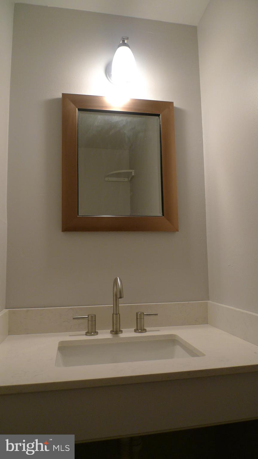 129 Briar Court Marlton, NJ 08053 - Photo 5 of 10 a bathroom with a sink and a mirror
