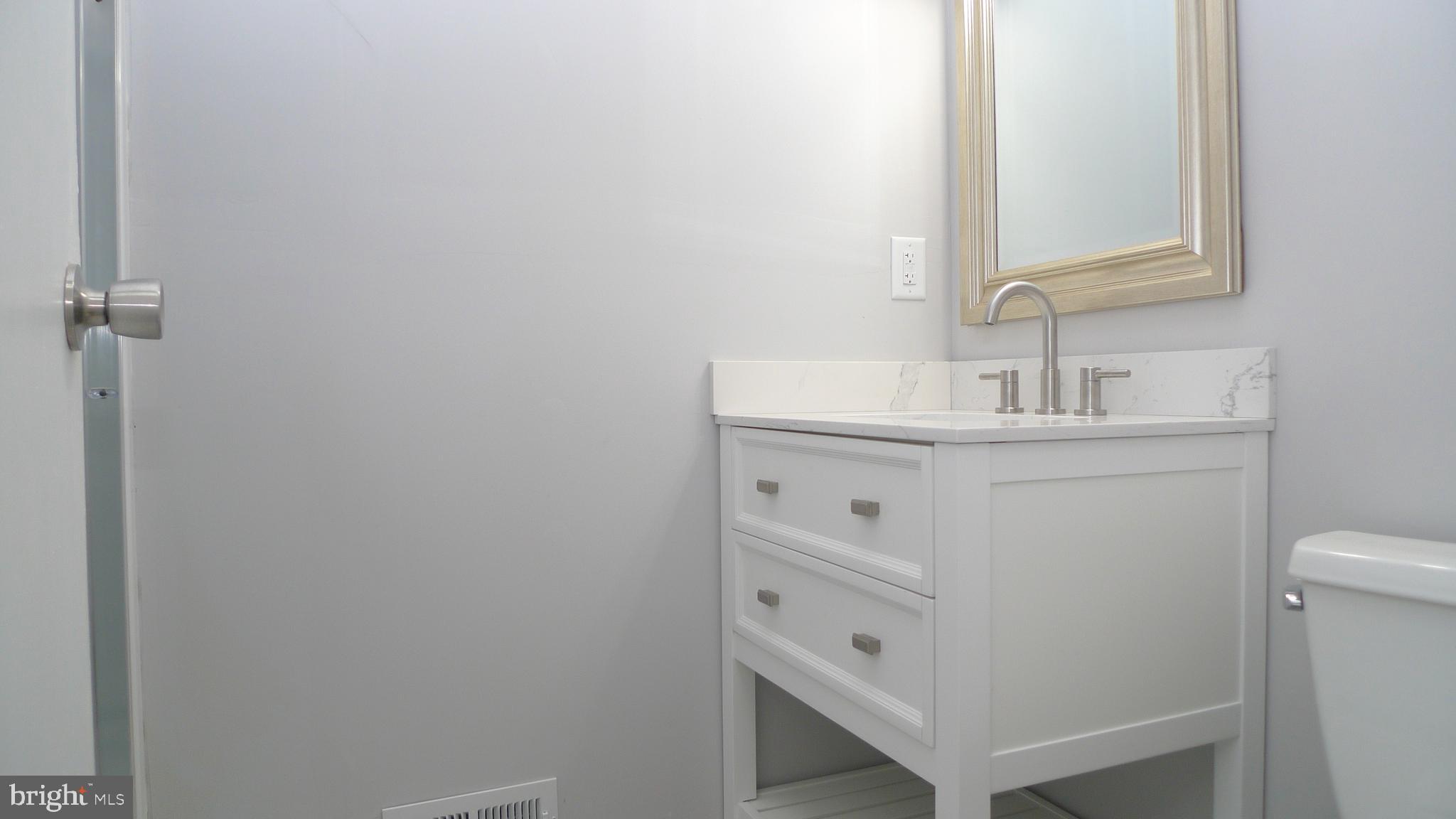 129 Briar Court Marlton, NJ 08053 - Photo 6 of 10 a bathroom with a sink and a mirror