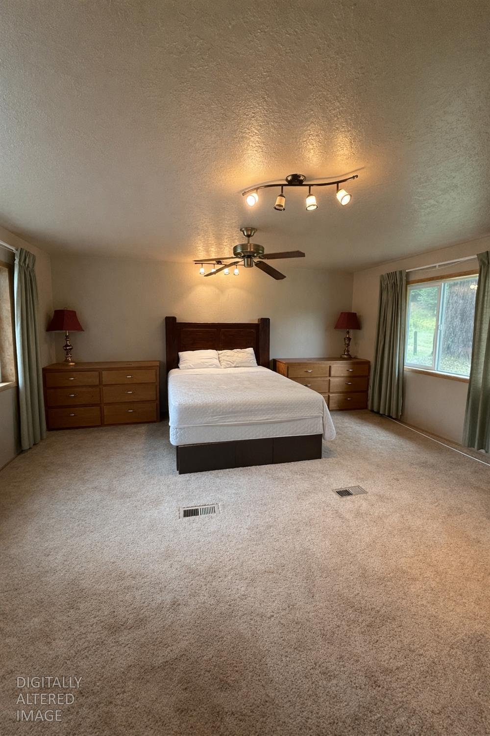 7300 Highway 193 Georgetown, CA 95634 - Photo 15 of 16 a bedroom with a bed and window