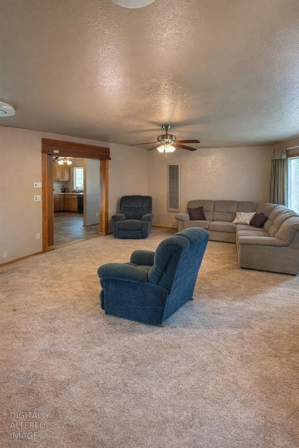 7300 Highway 193 Georgetown, CA 95634 - Photo 6 of 16 a living room with furniture and a chandelier