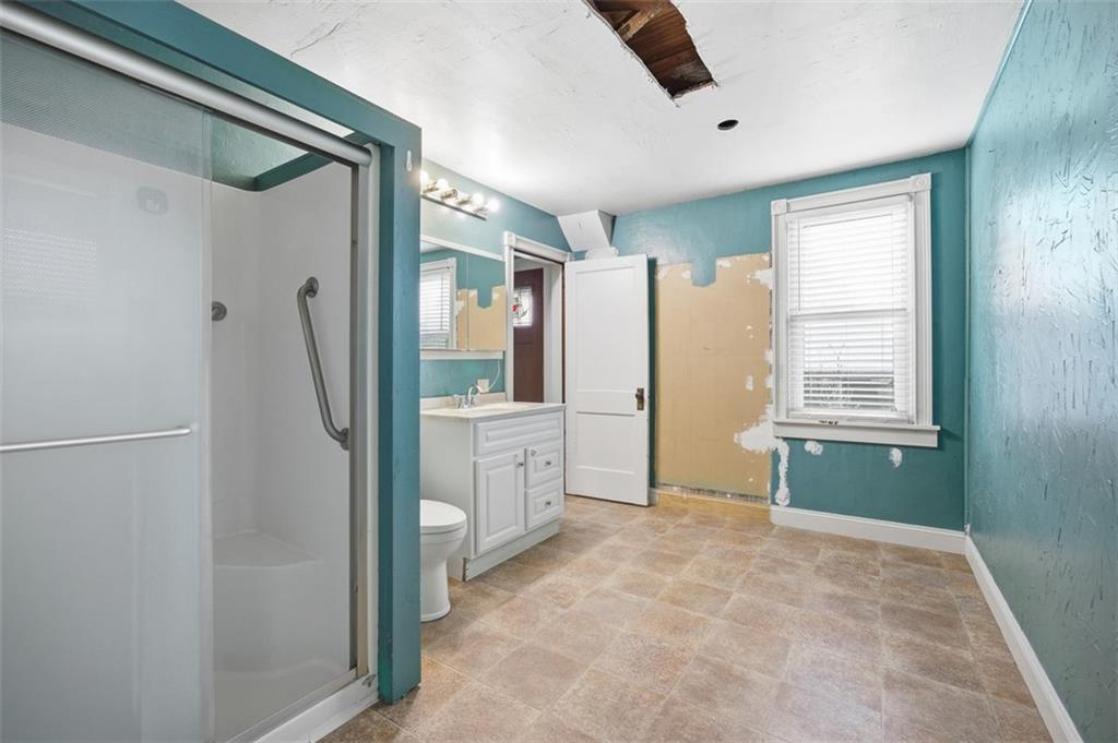 26 Covered Bridge Road Burgettstown, PA 15021 - Photo 11 of 49 a bathroom with a shower and a sink