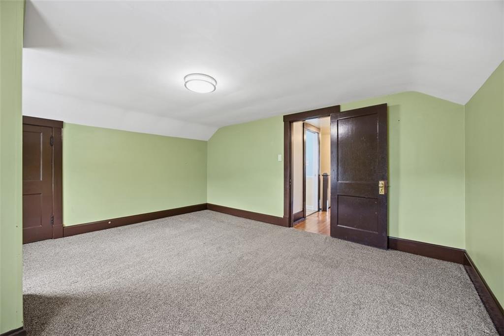 26 Covered Bridge Road Burgettstown, PA 15021 - Photo 16 of 49 a view of an empty room with wooden floor and closet