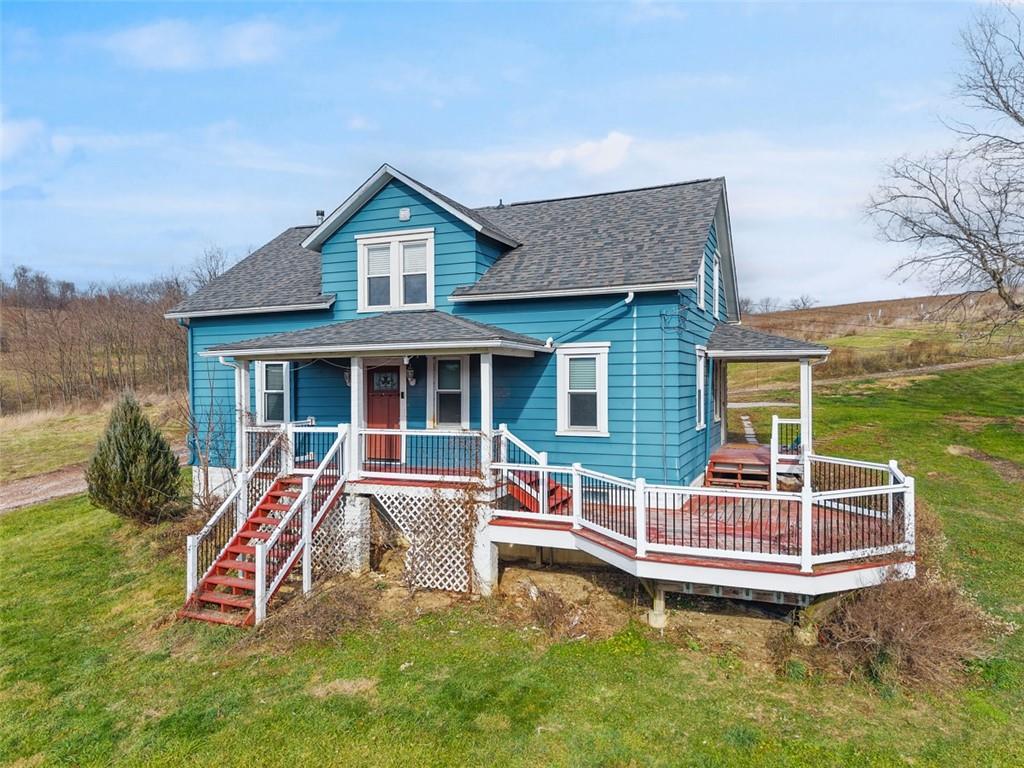 26 Covered Bridge Road Burgettstown, PA 15021 - Photo 2 of 49 a view of a house with a yard patio and a slide